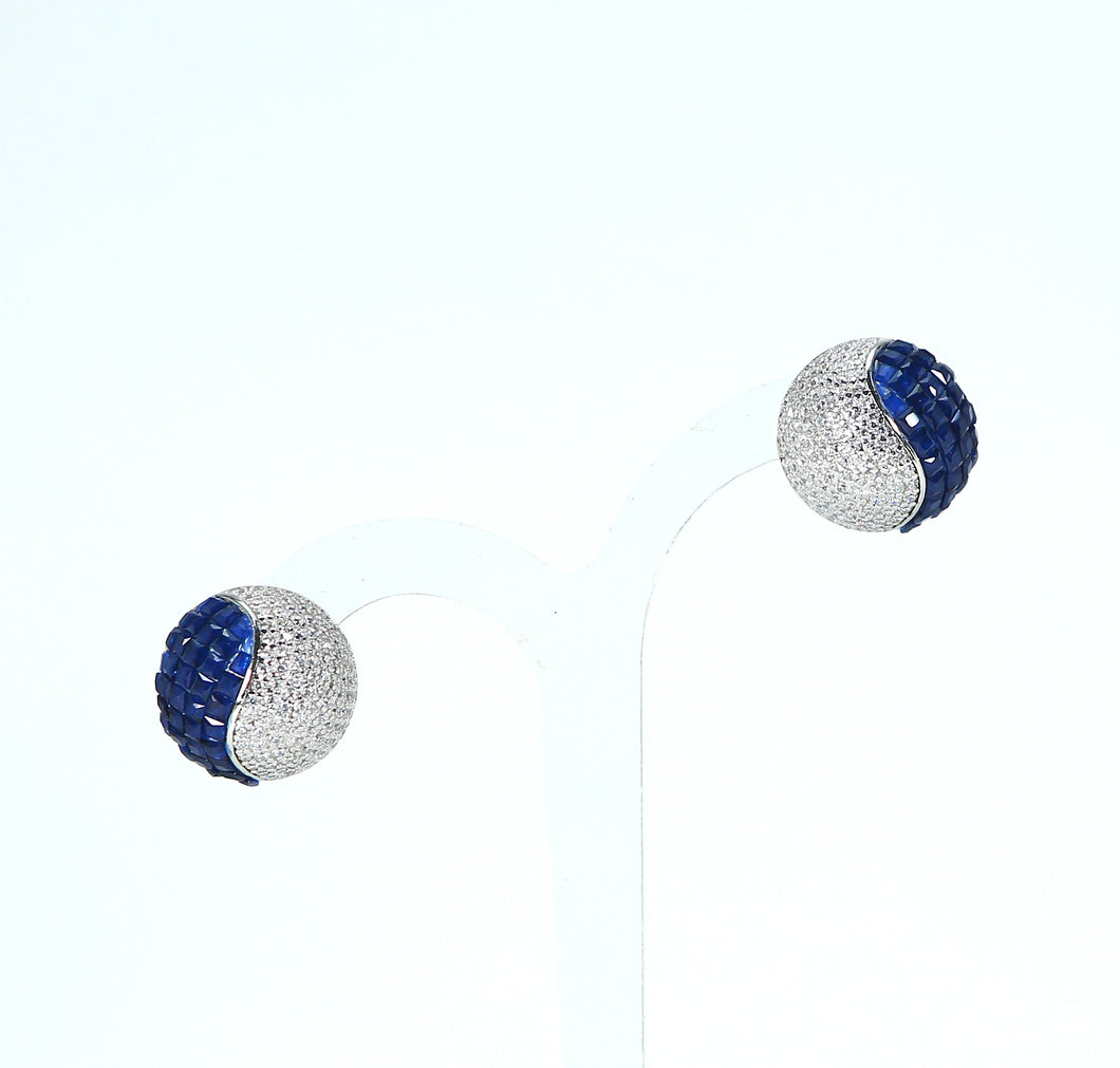 Round blue zircon ear tops.