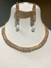 Load image into Gallery viewer, Necklace and earrings set.
