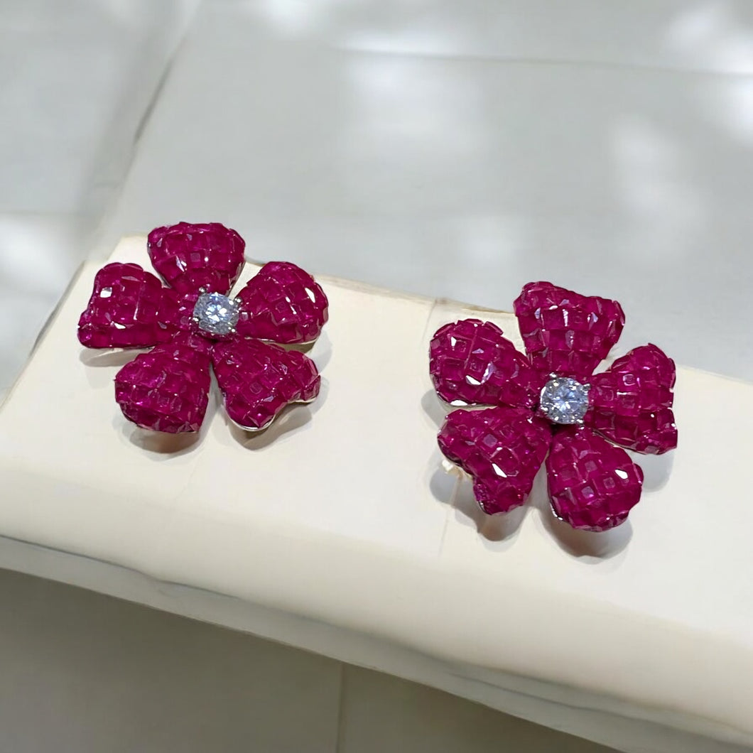 Red flower earrings.