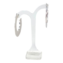 Load image into Gallery viewer, Silver color hoop earrings.
