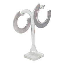 Load image into Gallery viewer, Silver color hoop earrings.
