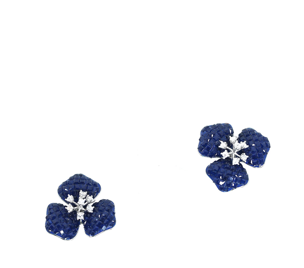 Blue flower earrings.