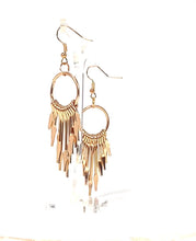 Load and play video in Gallery viewer, Gold color dangle earrings.
