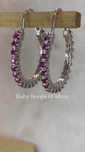 Load and play video in Gallery viewer, Ruby earrings in silver.
